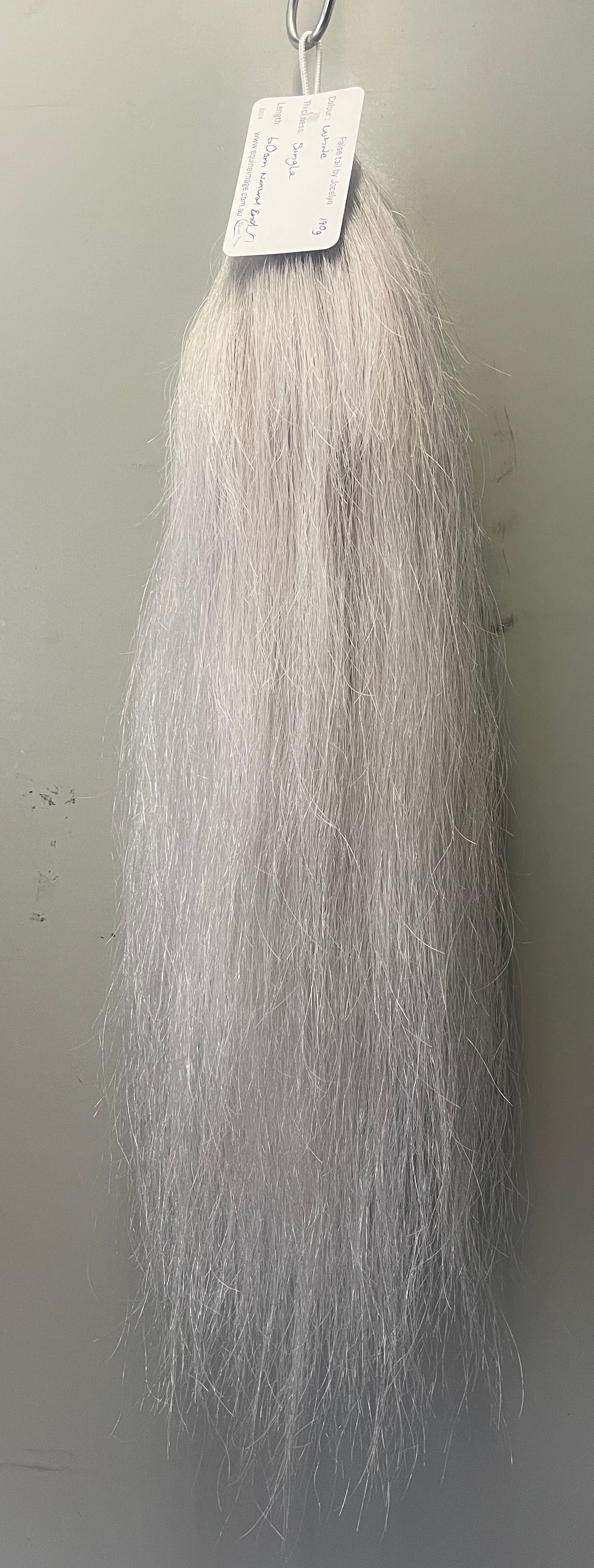 White silver white single thickness pony - young stock  length 60 cm natural end