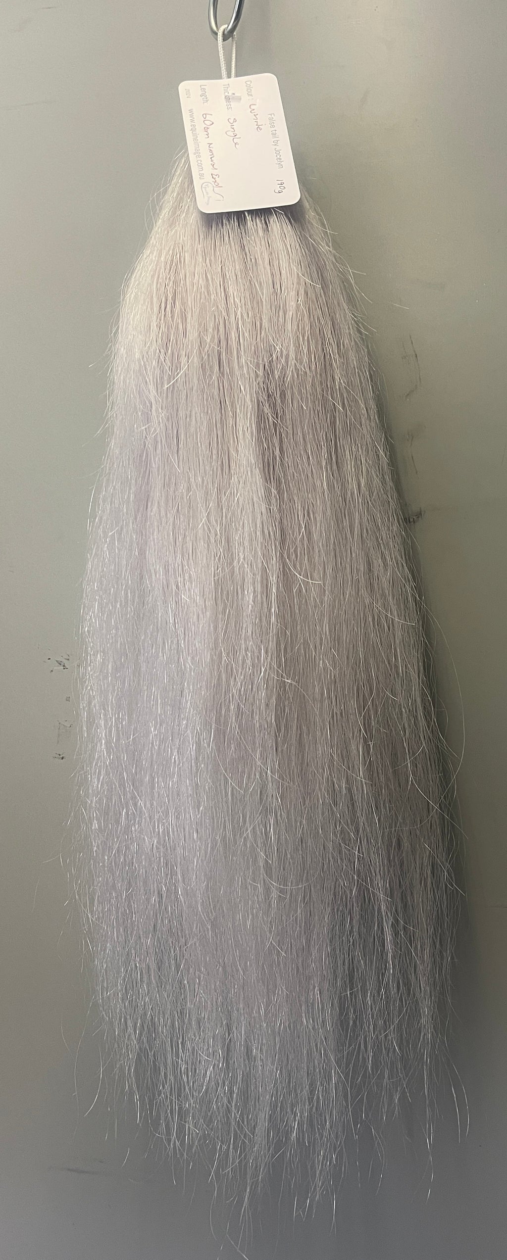 White silver white single thickness pony - young stock  length 60 cm natural end