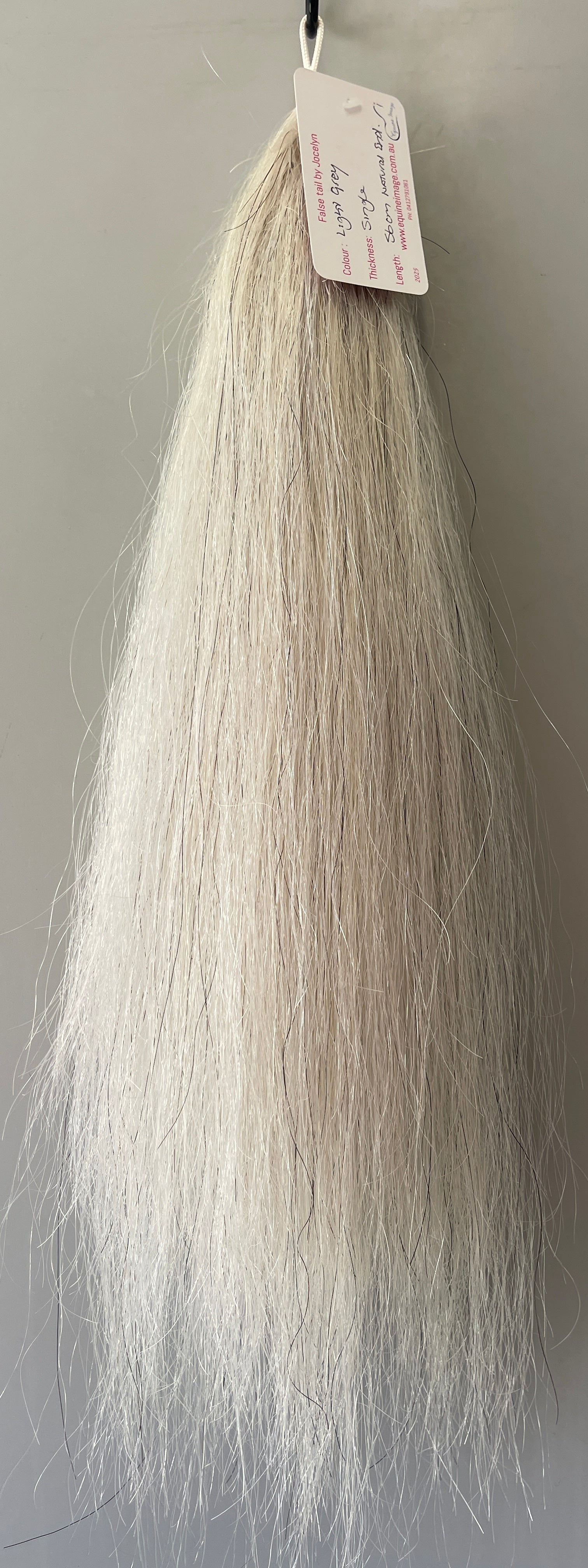 Very light grey single  thickness.     (1 times ) 56 cm natural end pony length