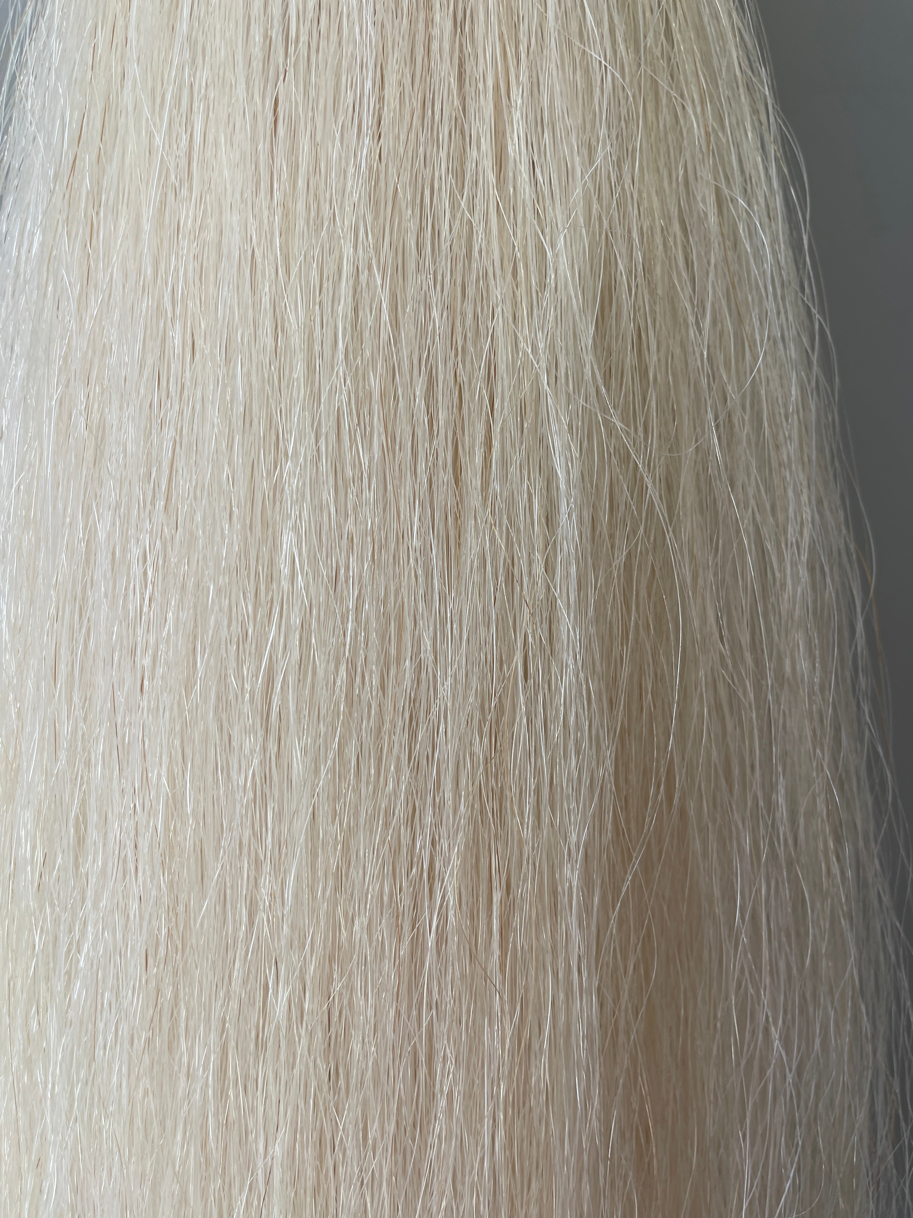 Weighted pally off white ( untoned white ) Double plus (2.5 times ) 62 cm cut end Final weight 700g
