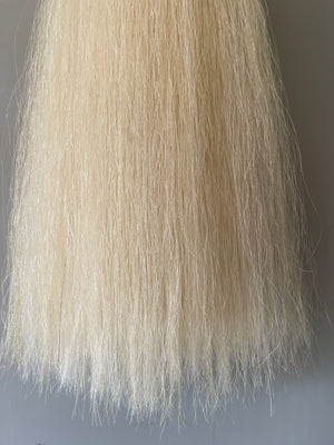 Weighted pally off white ( untoned white ) Double plus (2.5 times ) 62 cm cut end Final weight 700g