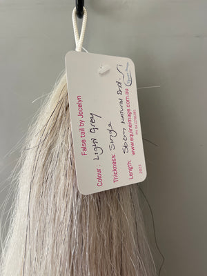 Very light grey single  thickness.     (1 times ) 56 cm natural end pony length