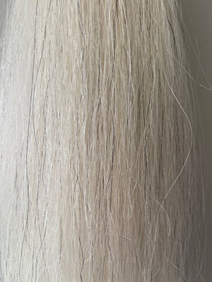 Very light grey single  thickness.     (1 times ) 56 cm natural end pony length